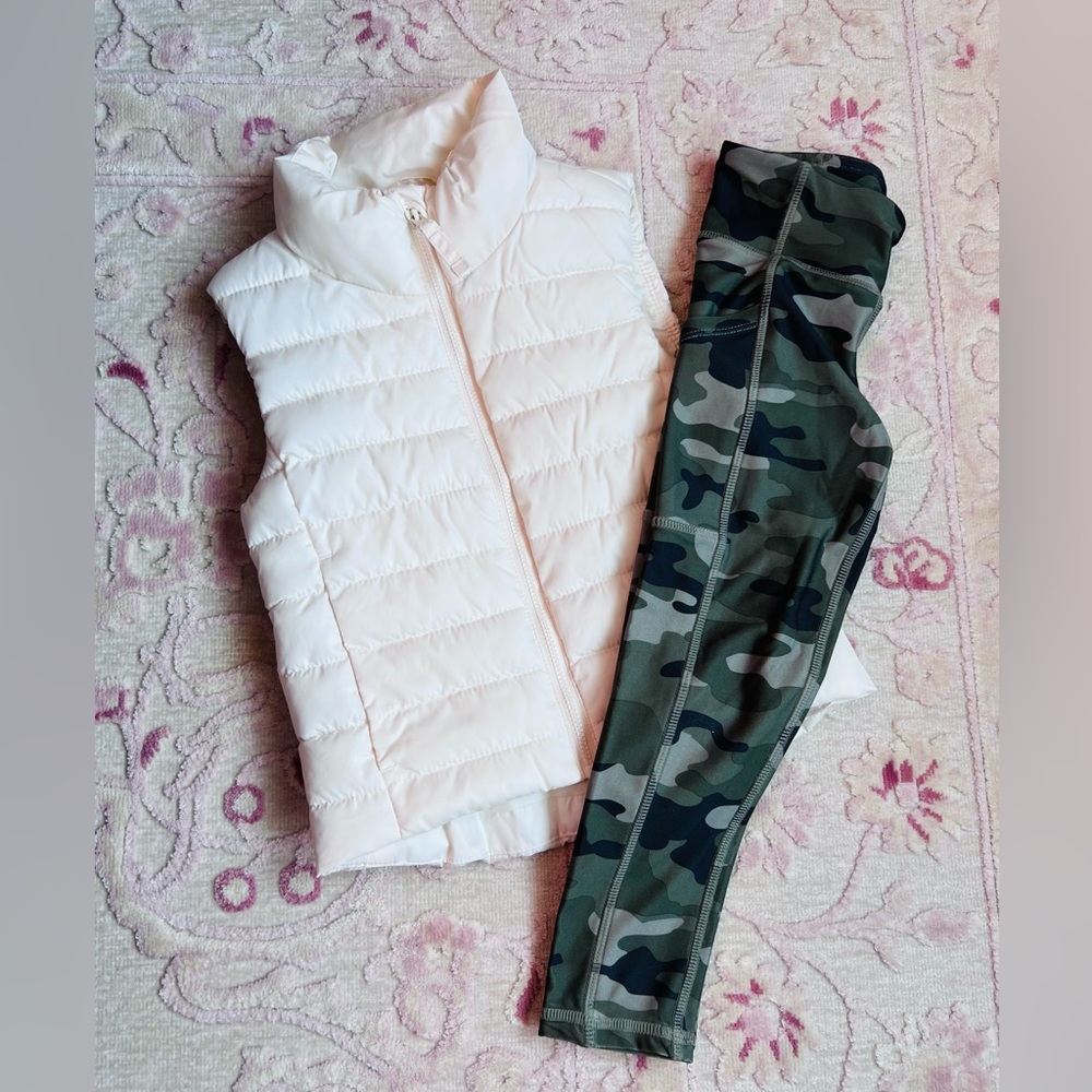 White Puffer Vest and Camouflage Leggings